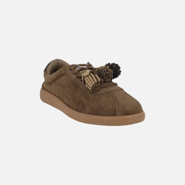 Sports shoes for women in brown suede with pompoms and tassels