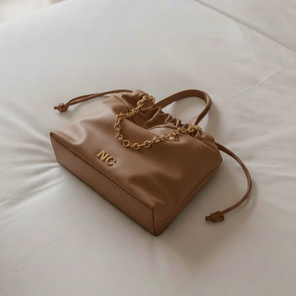Bolsos estilo saco con cadena de Noco