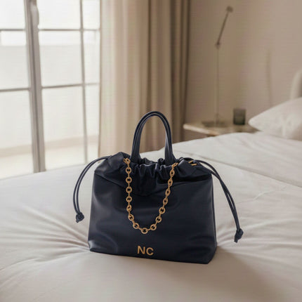 Bolsos estilo saco con cadena de Noco