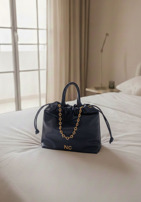 Bolsos estilo saco con cadena de Noco