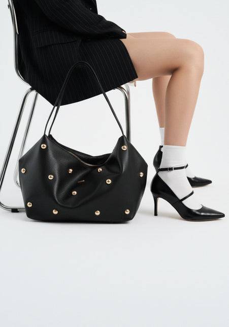 Bolsos negros efecto piel para hombro con tachas color oro