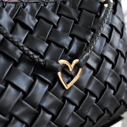 Bolsos negros trenzados con doble asa