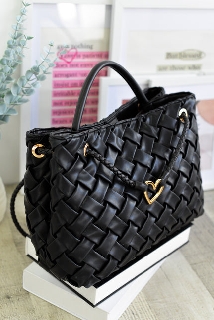 Bolsos negros trenzados con doble asa