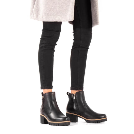 Black heeled ankle boots with zippers and fur lining PAULINE TRAV