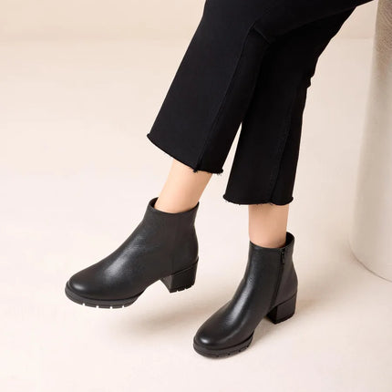 Jaydi black leather ankle boots with wide heels and platform