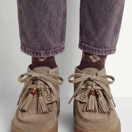 Women's lace-up ankle boots in suede leather with tassel and bead detail