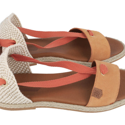 Flat espadrilles with clear ribbons