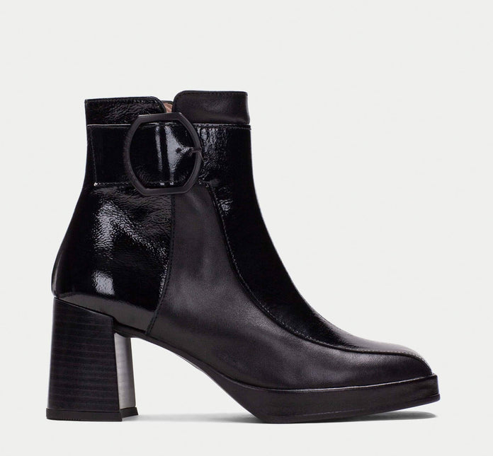 Black patent leather ankle boots with buckle ornament