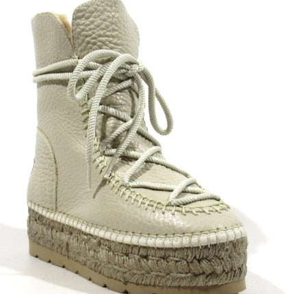 Raw leather boots with laces and yute platform