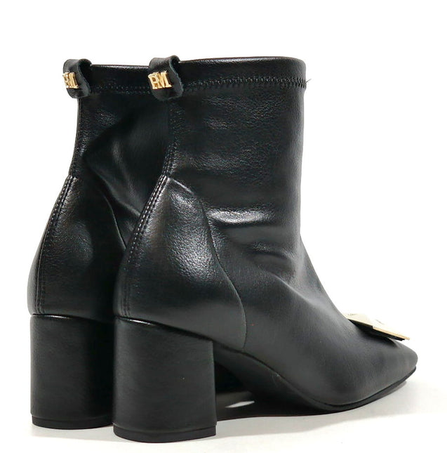 Black boots in elastic fabric leather effect for women