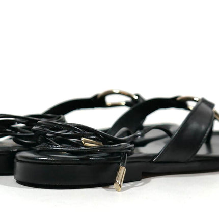 Slave leather sandals with ring and ribbons