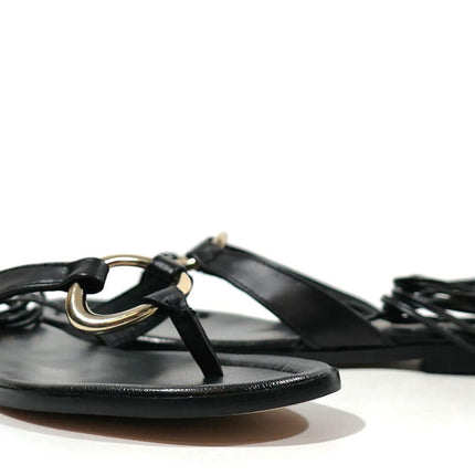 Slave leather sandals with ring and ribbons