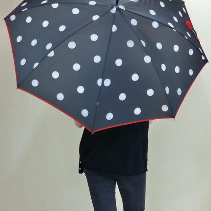 Paraguas automático negro con topos blancos
