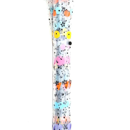 Transparent manual umbrellas with colored moles and stars