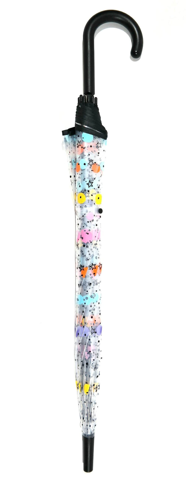 Transparent manual umbrellas with colored moles and stars