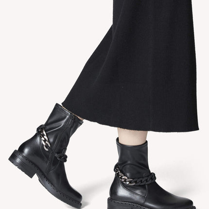 Black booties in leather combined and elastic fabric